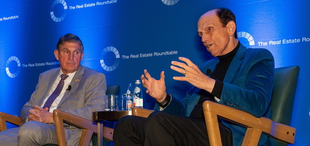 Sen. Joe Manchin, left, with Financier Michael Milken at The Real Estate Roundtable's 2024 State of the Industry Meeing