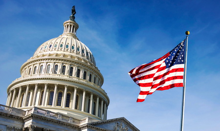 Capitol building with flag