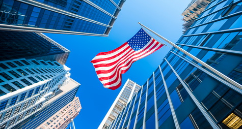 Modern buildings and American flag